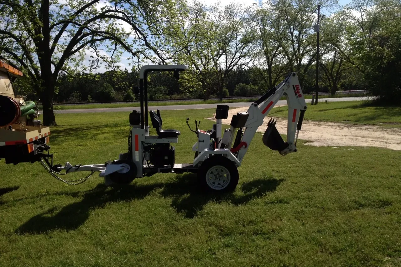 Digger machine preparing a septic installation